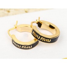 Miu Miu Enameled metal earrings black 2024