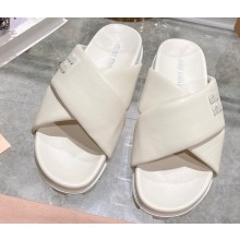 Miu Miu Leather slides Creamy with metal lettering logo 2023
