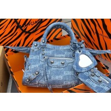 Balenciaga Neo Cagole XS Handbag in blue BB Monogram bleached denim