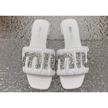 Miu Miu Matelassé nappa leather Heel slides White with Crystal Logo 2024