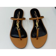 Saint Laurent cassandra slides in vegetable-tanned leather 776081 MARRON GOLD 2024