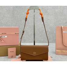Miu Miu Leather wallet with leather and cord shoulder strap 5MT025 Cognac 2024
