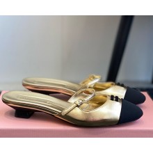 Miu Miu Leather mules with buckle gold 2025