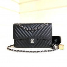 Chanel BLACK Chevron Medium Flap Bag in caviar leather With Silver Hardware