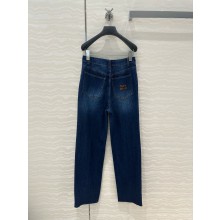MIU MIU NAVY Washed denim flared jeans 2025