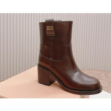 Miu Miu Fumé leather booties brown 2023