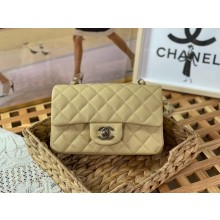 Chanel Mini Classic Flap Handbag A69900 in caviar leather light yellow with silver hardware