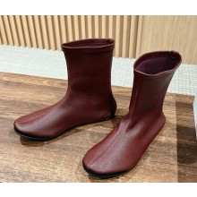 The Row Elastic sheepskin ankle boots in burgundy 2024