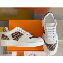 HERMES Free sneaker in calfskin and "H en Biais" canvas 02 2025