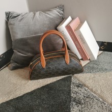 CELINE MEDIUM TECKEL IN TRIOMPHE CANVAS AND CALFSKIN TAN