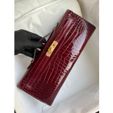 Hermes burgundy Kelly Cut 31cm porosus shiny Leather Clutch Gold/Silver Hardware 