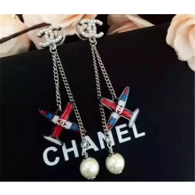 Chanel plane & pearl earrings 2016