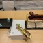 Prada Metallic leather slides Gold 2023