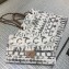 Chanel Printed Toile Clutch Bag Beige A91749 2018