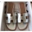Hermes Oran Flat Slipper Sandals in Metallic Leather Silver