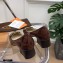 Tod's Heel 4.5cm Kate Pumps in leather with Chain Embossed Coffee
