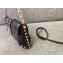 VALENTINO Rockstud black leather baguette bag 2024