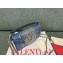 Valentino Garavani small Locò studded denim shoulder bag 01 2024