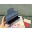 Valentino Garavani small Locò studded denim shoulder bag 01 2024