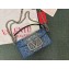Valentino Garavani small Locò studded denim shoulder bag 01 2024