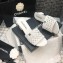 Chanel Shiny Braided Goatskin Heel Mules G37405 White 2021