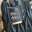 Miu Miu Matelassé nappa leather top-handle Medium bag 5BB124 Black 2022