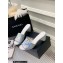 Chanel Camellia Embossed Logo Heel Mules Silver 2023