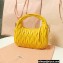 Miu Miu Wander matelassé nappa leather mini hobo bag 5BC125 Yellow