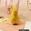 Miu Miu Wander matelassé nappa leather mini hobo bag 5BC125 Yellow