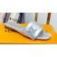 Louis Vuitton Shake Flat Mules in Metallic lambskin Silver 2023