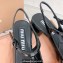 Miu Miu Heel Patent leather slingback pumps with metal lettering logo Black 2023