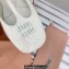 Miu Miu Heel Patent leather slingback pumps with metal lettering logo White 2023