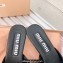Miu Miu Heel Patent leather Mules with perforated logo Black 2023