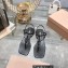 Miu Miu Patent thong sandals Black with metal lettering logo 2023
