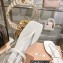 Miu Miu Patent thong sandals White with metal lettering logo 2023