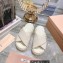 Miu Miu Leather Platform slides Creamy with metal lettering logo 2023