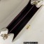 Saint Laurent cassandra medium top handle in grain de poudre embossed leather 623931 White