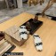 Balenciaga Teddy Mules White in fake fur and black contrasted Allover Logo 2023