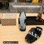 Balenciaga Teddy Mules Black in fake fur and black contrasted Allover Logo 2023