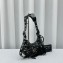Balenciaga Le Cagole XS Shoulder Bag in Arena lambskin Black with piercing