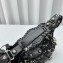 Balenciaga Le Cagole XS Shoulder Bag in Arena lambskin Black with piercing