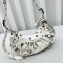 Balenciaga Le Cagole XS Shoulder Bag in Arena lambskin White with piercing