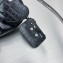 Balenciaga Le Cagole XS Shoulder Bag in crocodile embossed calfskin Black with rhinestones