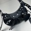 Balenciaga Le Cagole XS Shoulder Bag in Arena lambskin Black with rhinestones