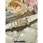 Dior Medium DiorTravel Nomad Pouch bag in Macrocannage Calfskin Beige