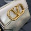 Valentino VSLING micro handbag in Calfskin Metallic Gold 2023