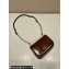 Prada Brushed leather mini-bag with shoulder strap 2VD061 Brown 2023