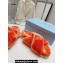 Prada Enameled metal triangle logo shearling Crisscross sandals 1XX600 Orange 2023