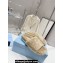 Prada Enameled metal triangle logo shearling Slide sandals Beige 2023