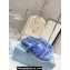 Prada Enameled metal triangle logo shearling Slide sandals Blue 2023